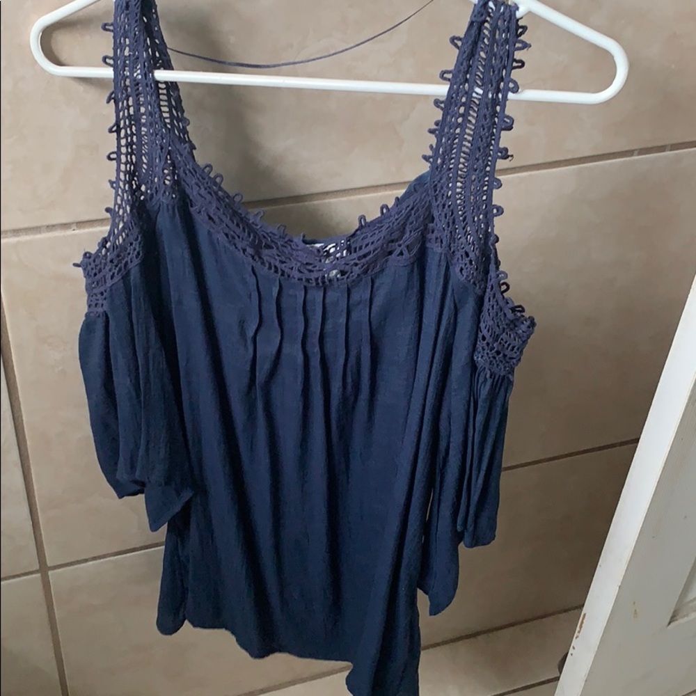 Navy blue top with lace accents